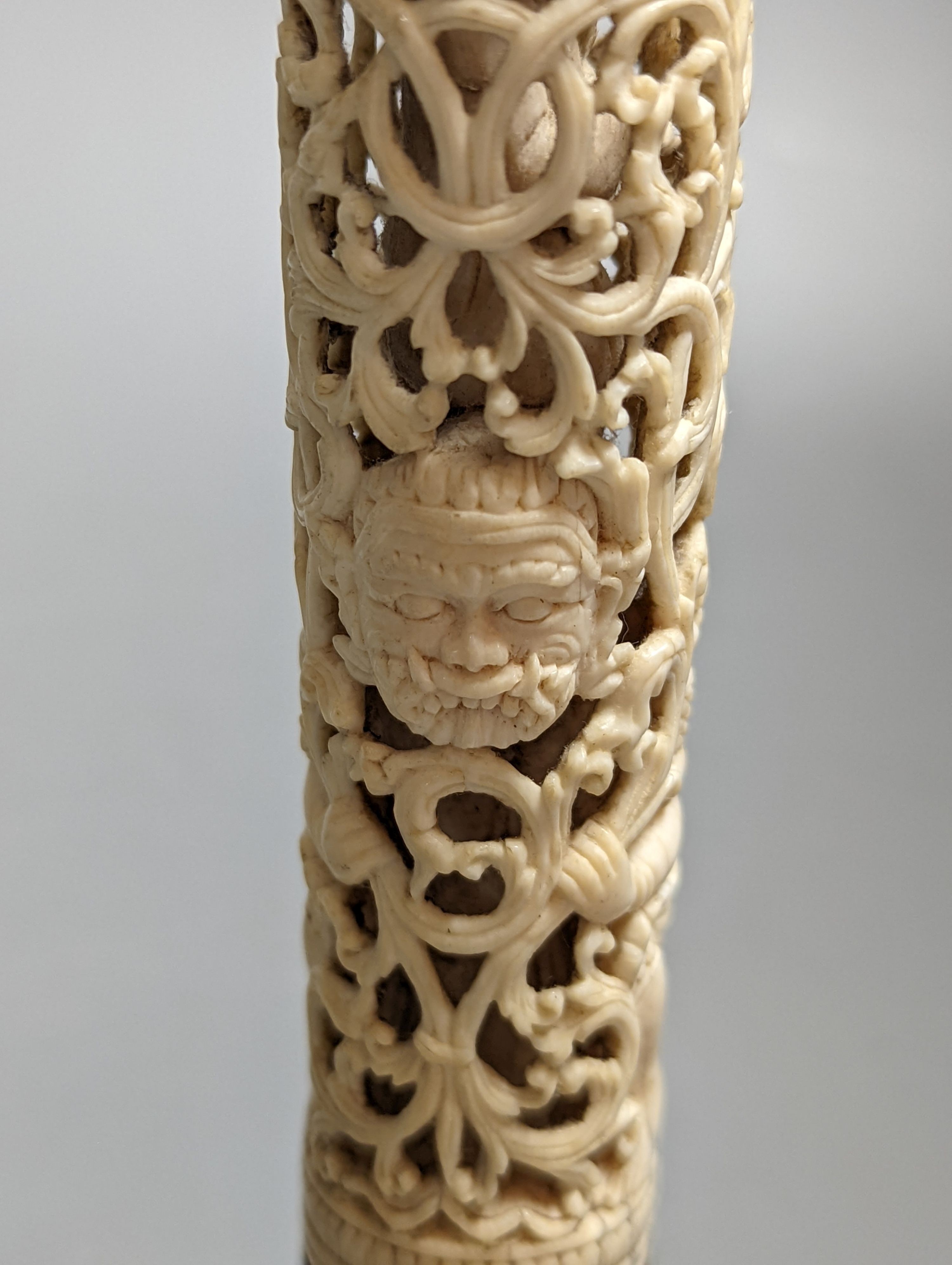 A 19th century Burmese carved ivory paper knife handle 15cm